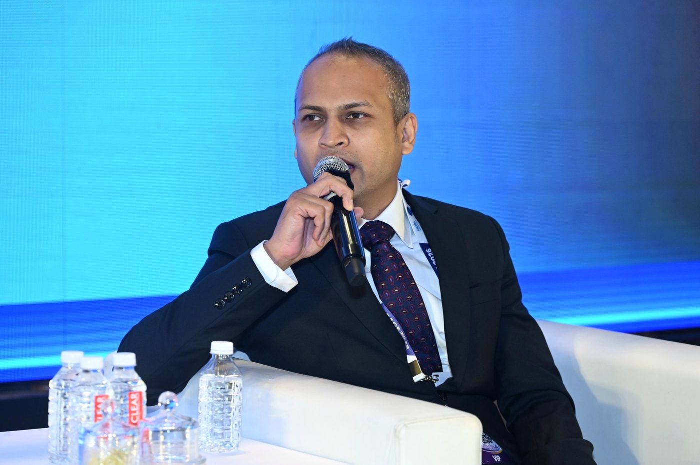 Mehul Bhandari, Principal of RegStack Access, speaking on the Unlocking India's Orbit panel at IEEE Space 2026 in Bengaluru.